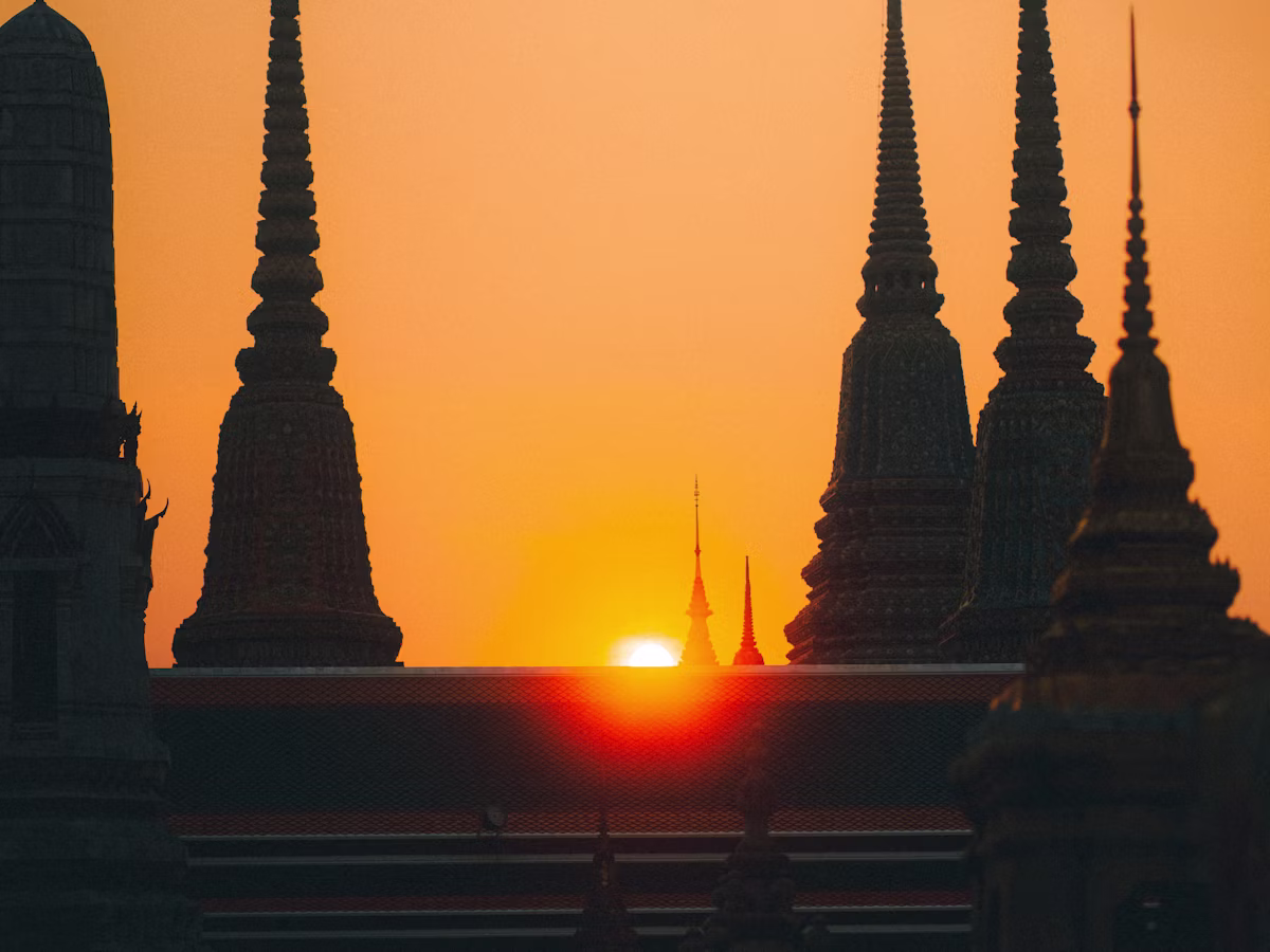 Temple skyline at sunset in Thailand