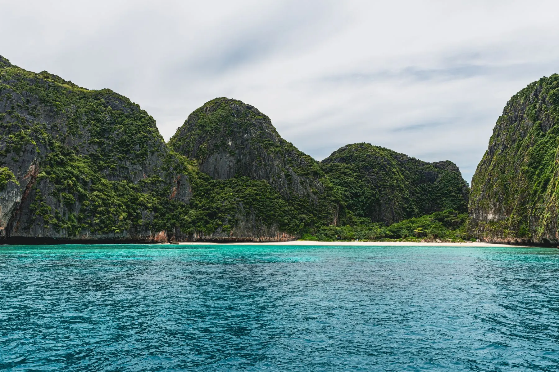 Turquoise water and limestone cliffs on the Andaman coast near Phuket