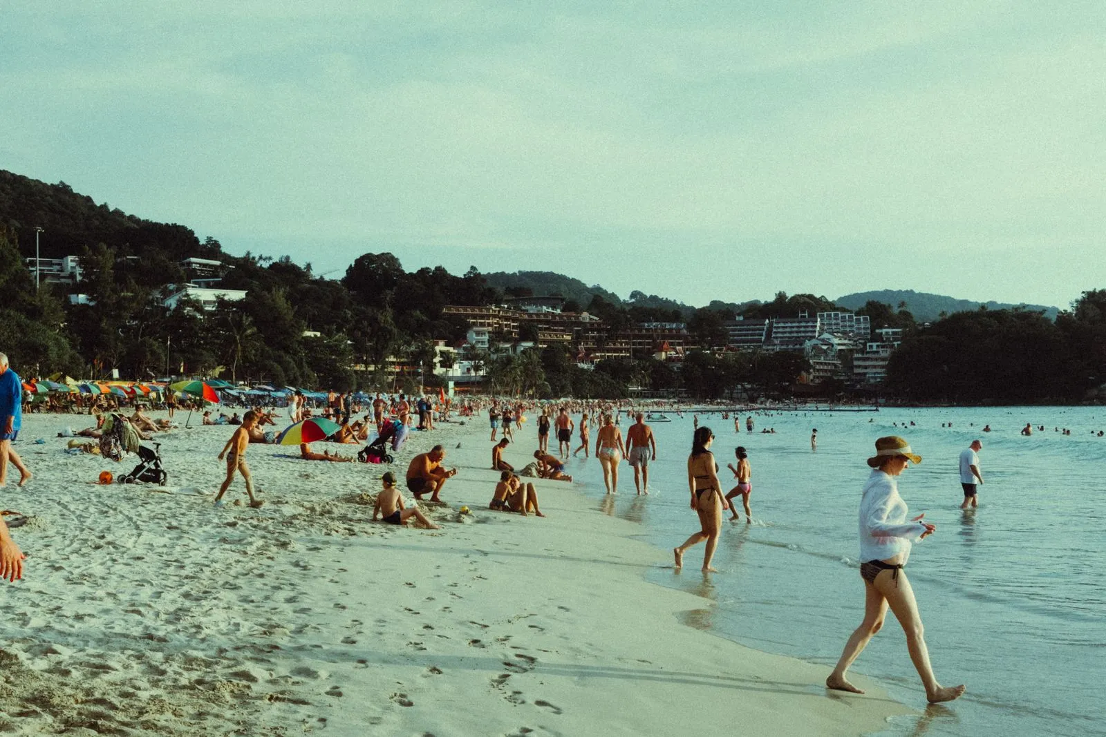 Residents and visitors spending the afternoon on a Phuket beach