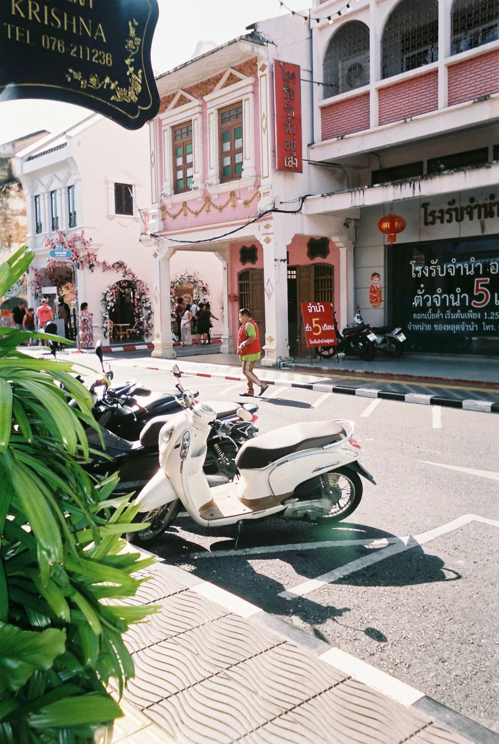 Scooters parked beside Sino-Portuguese buildings in Phuket Town