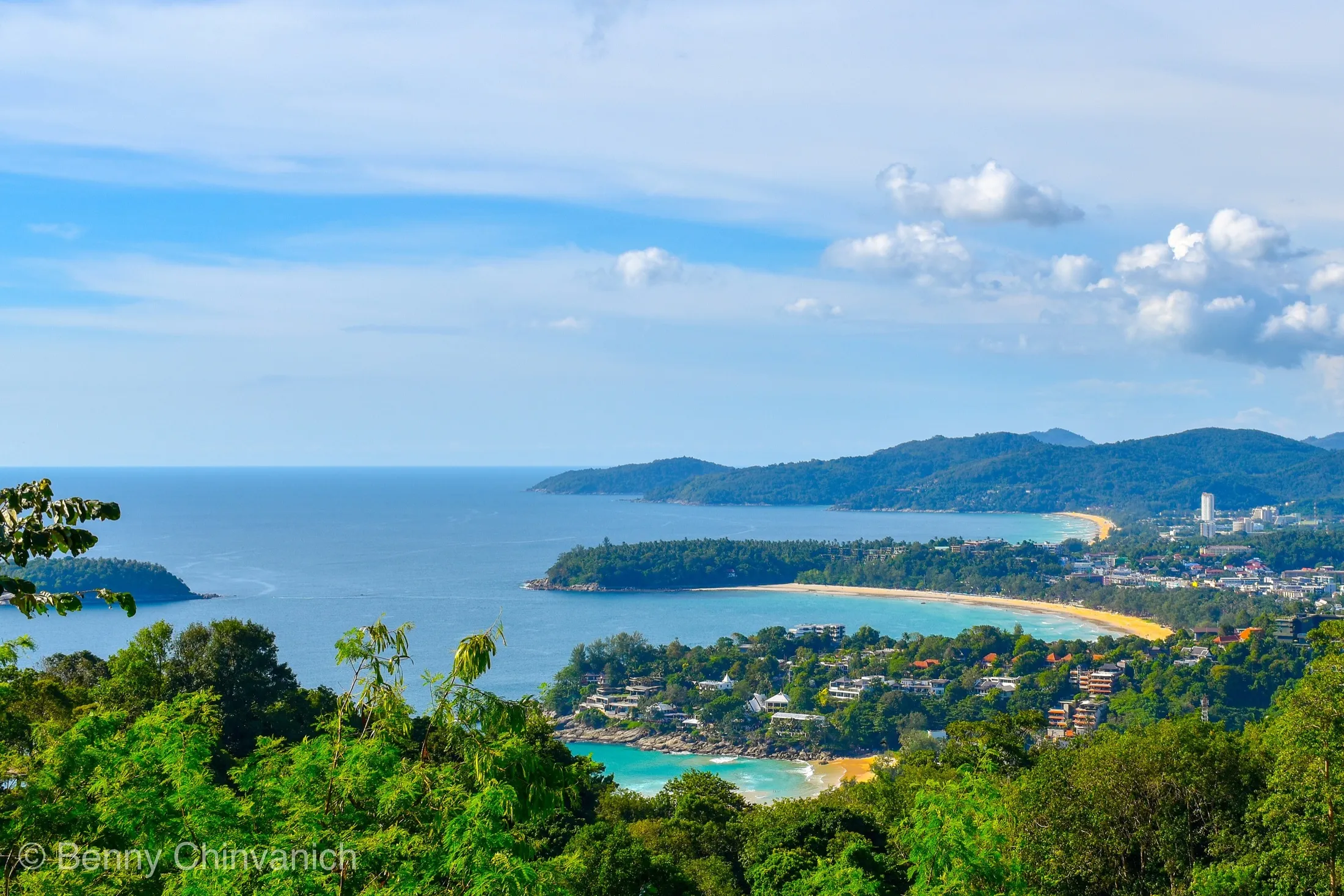 Phuket's west-coast beaches and green hills viewed from above