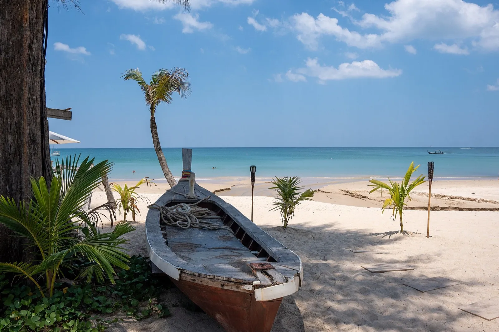 A traditional boat on Bang Tao Beach in Phuket