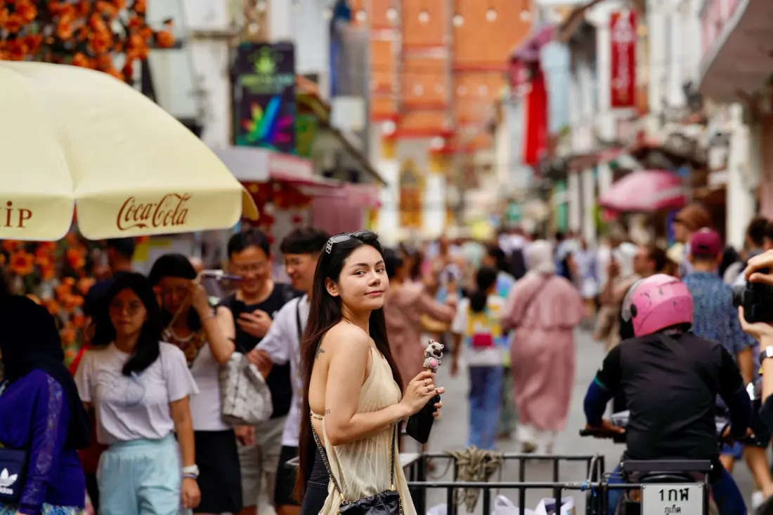 Daily street life in a busy Phuket neighbourhood