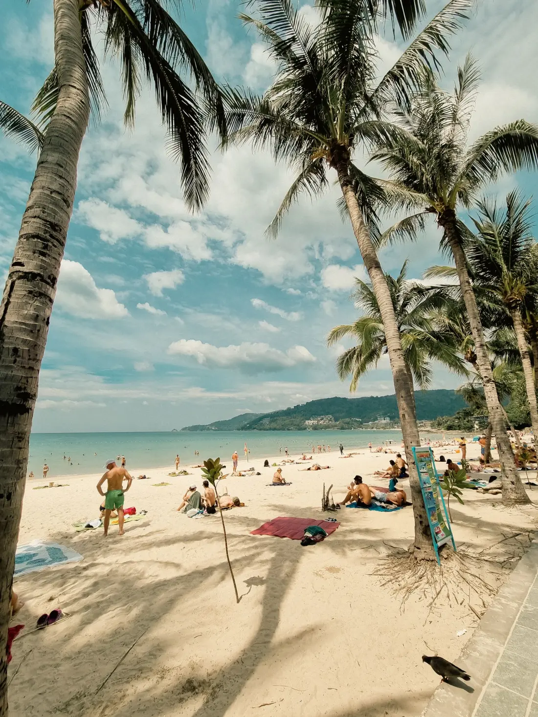 People enjoying a sunny day at Patong Beach in Phuket