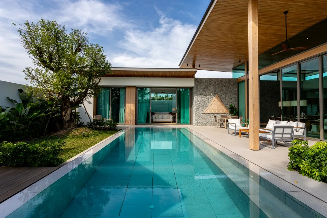 Private pool and covered terrace at the completed Mono Champaca B1 show villa